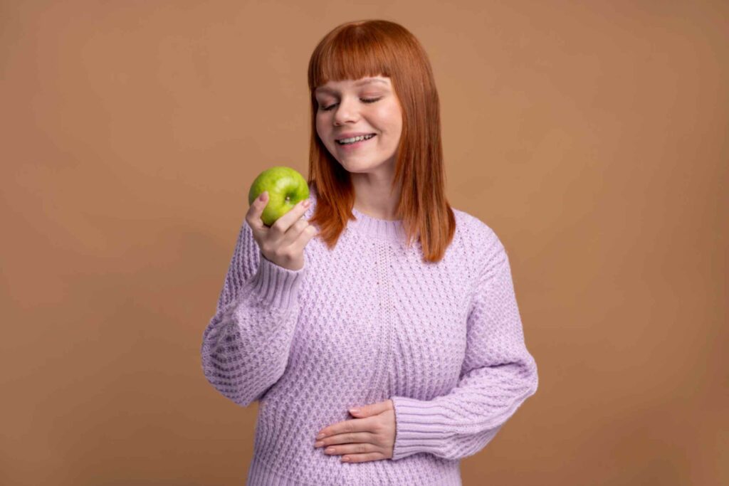 jpeg optimizer woman with eating disorder deciding which food eat - Fit Kilter
